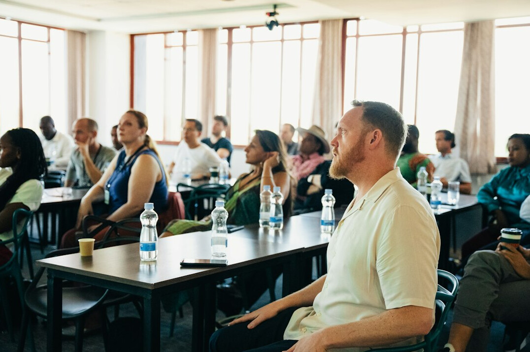 man presenting in business seminar