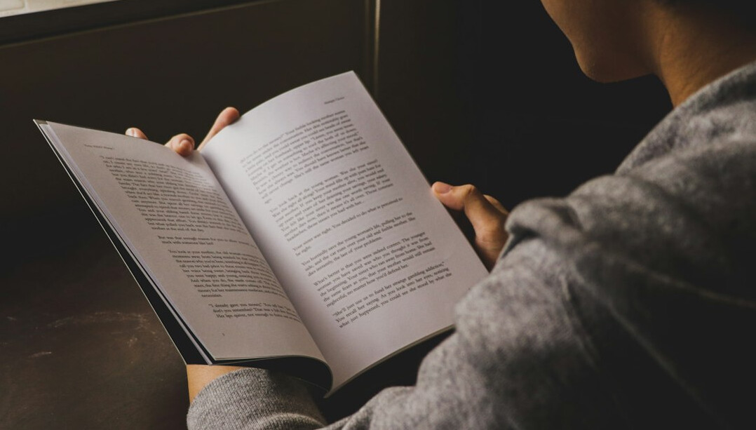 person reading book